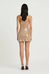 Lucca Mini Dress by Benni, a shimmering sequin mini with contrast black straps. Perfect for nights out, parties, or festive occasions.