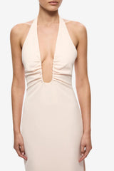 Luci Crepe Dress by Misha, a soft pink halter midi with plunging neckline, waist ruching and side split for elegant events.