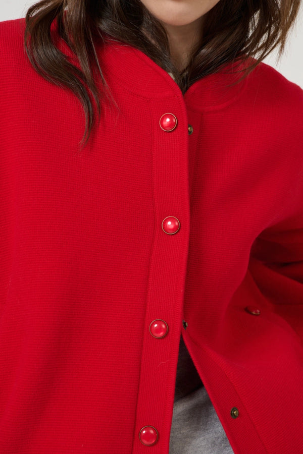 Lucia Bomber Red by Onte - red knit bomber jacket with snap buttons and rib trim, designed for a structured modern look.