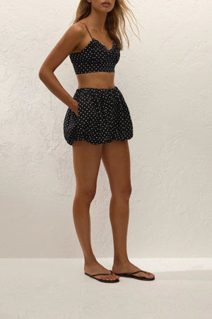 Lucia Top Lola Polka Dot Black Cream by Faithfull the Brand – a cropped top with polka dot print. Perfect for summer styling.