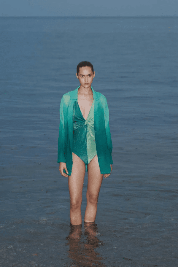 Lulu Shirt Evergreen by Baobab – a sheer shirt with button front and silky drape. Perfect for layering or resort styling.