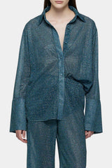 Lumière Sleeves Shirt Peacock by Oséree, a metallic statement shirt with voluminous sleeves for chic resort and evening styling.