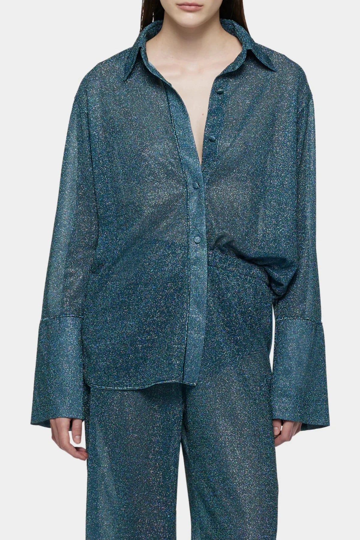 Lumière Sleeves Shirt Peacock by Oséree, a metallic statement shirt with voluminous sleeves for chic resort and evening styling.
