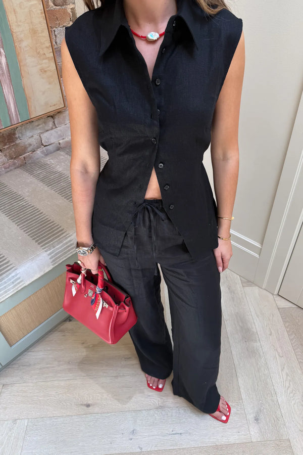 Luna Linen Pant in Black by Sneaky Link – a breathable linen pant with elastic waist and relaxed fit. Perfect for effortless summer styling.