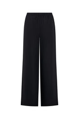 Luna Linen Pant in Black by Sneaky Link – a breathable linen pant with elastic waist and relaxed fit. Perfect for effortless summer styling.