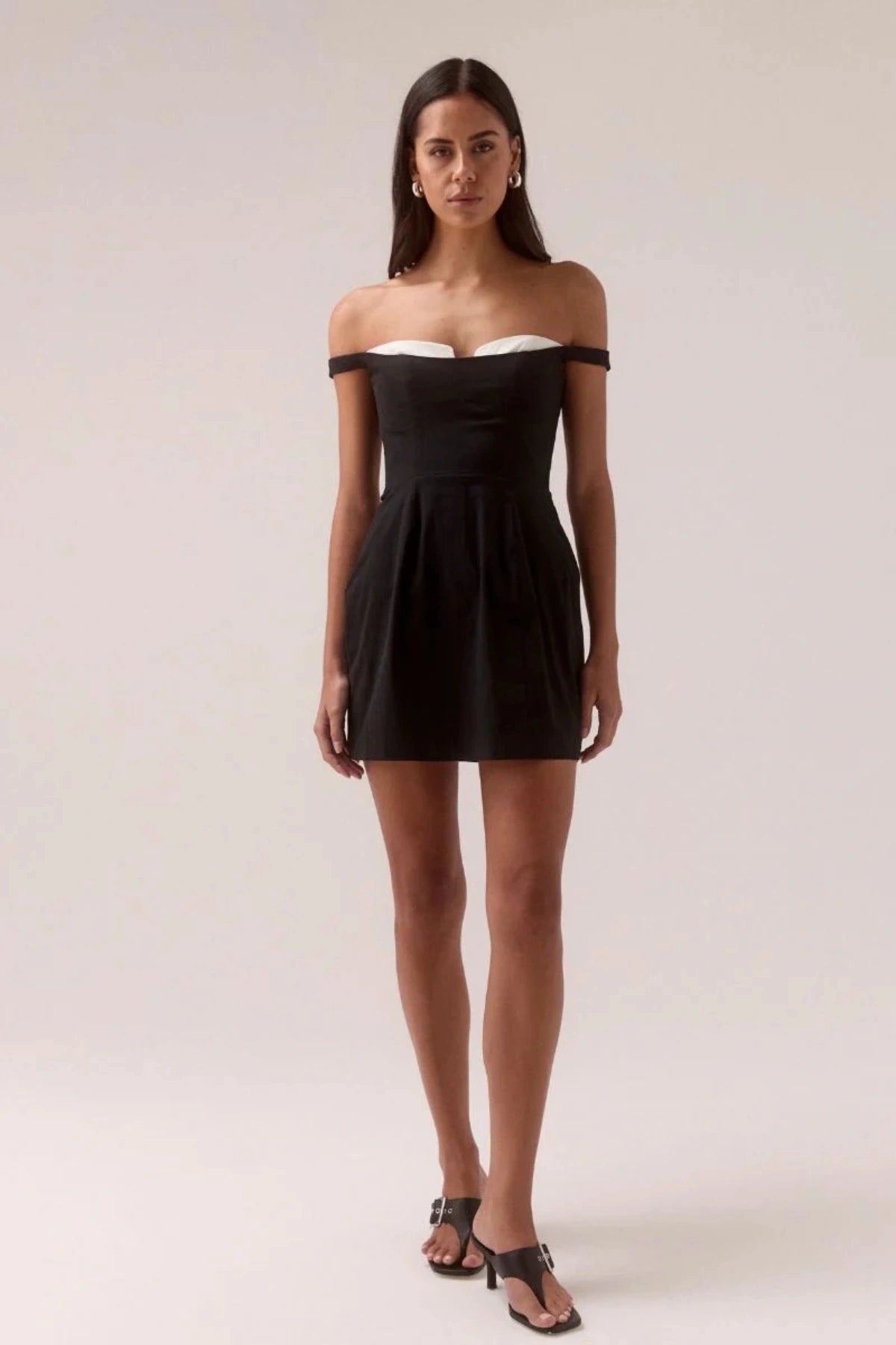 Lure Mini Dress Black/White by Sovere, off-shoulder mini with contrast bust cups and shirred sides, perfect for chic evenings or events.