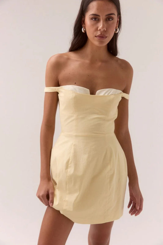 Lure Mini Dress Lemonade by Sovere, off-shoulder mini with contrast bust cups and shirred sides, perfect for summer days or evenings.