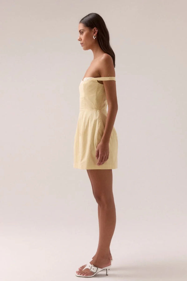 Lure Mini Dress Lemonade by Sovere, off-shoulder mini with contrast bust cups and shirred sides, perfect for summer days or evenings.