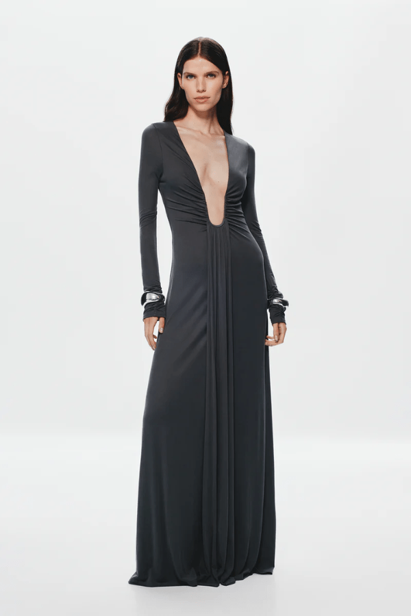 Sisal Dress Port by Misha, asymmetrical maxi dress in port mesh, twisted off-shoulder neckline, gathered waist with floor-length sash, body-skimming silhouette, dry clean only.