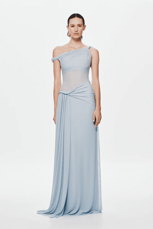 Sisal Dress Dove by MISHA, asymmetrical maxi dress in dove mesh, twisted off-shoulder neckline, gathered waist with floor-length sash, body-skimming silhouette, dry clean only.