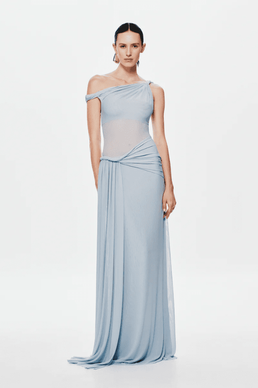 Sisal Dress Dove by MISHA, asymmetrical maxi dress in dove mesh, twisted off-shoulder neckline, gathered waist with floor-length sash, body-skimming silhouette, dry clean only.