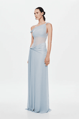 Sisal Dress Dove by MISHA, asymmetrical maxi dress in dove mesh, twisted off-shoulder neckline, gathered waist with floor-length sash, body-skimming silhouette, dry clean only.