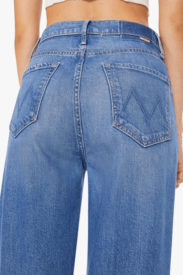High Waisted Tunnel Vision Sneak Field Trip by MOTHER, mid-blue straight leg jeans in semi-rigid denim with a soft vintage fade. Perfect for daily wear.