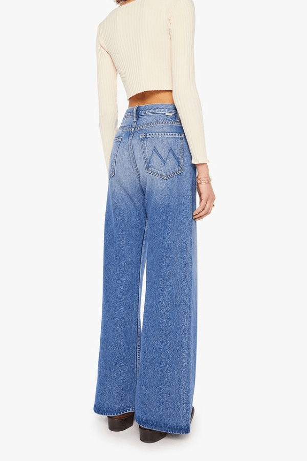 The Lemon Twist Rolling In The Dough by MOTHER, rigid wide-leg jeans with playful candy hardware. Perfect for standout off-duty styling.