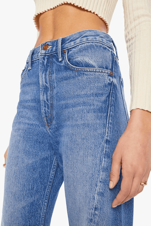 The Lemon Twist Rolling In The Dough by MOTHER, rigid wide-leg jeans with playful candy hardware. Perfect for standout off-duty styling.