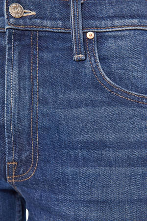 MOTHER The Bookie Sneak in Perfectly Imperfect, a high-rise bootcut jean in semi-rigid SUPERIOR denim with a clean hem and rich dark blue wash