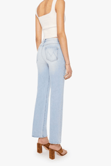 The Kick It Go Long by MOTHER, high-rise straight jeans in light blue semi-rigid denim with fading. Perfect for everyday vintage-inspired style.