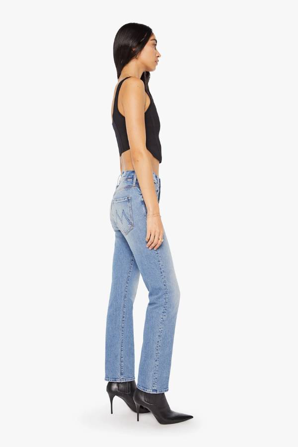 MOTHER The Mid Rise Hiker Hover in Fight For Your Right, a slim straight-leg jean with a mid-rise fit in a mid-blue wash with clean hem.