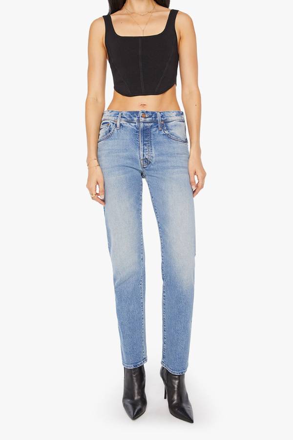 MOTHER The Mid Rise Hiker Hover in Fight For Your Right, a slim straight-leg jean with a mid-rise fit in a mid-blue wash with clean hem.