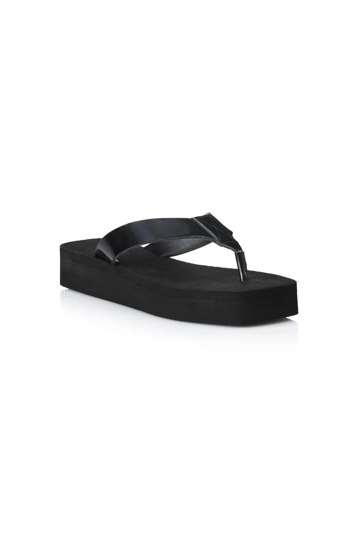 Maggie Sandal by Alias Mae, a black leather thong sandal with a 3.5cm platform sole. Perfect for modern casual styling all day.