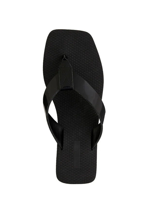 Maggie Sandal by Alias Mae, a black leather thong sandal with a 3.5cm platform sole. Perfect for modern casual styling all day.
