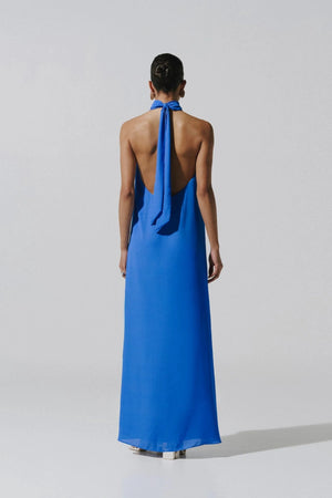 Magia Salvaje Maxi Dress by Baobab, halter-neck cutout dress in lightweight woven fabric with open back and self-tie straps, perfect for sun-soaked events.