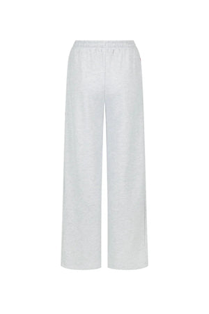 Malta Trackpant Cloud by Araminta James, wide-leg brushed cotton fleece with elastic waistband and side pockets, perfect for relaxed, coordinated resort style.