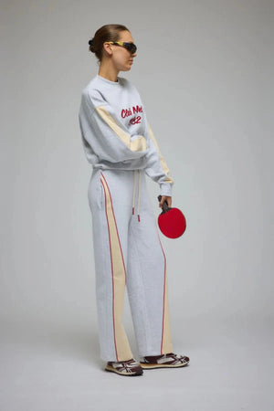 Malta Trackpant Cloud by Araminta James, wide-leg brushed cotton fleece with elastic waistband and side pockets, perfect for relaxed, coordinated resort style.