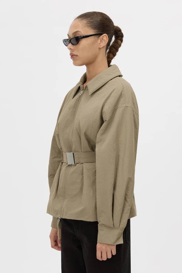 Manon Padded Belted Jacket Clay by camilla and marc – hammered texture belted puffer jacket with utility buckle.