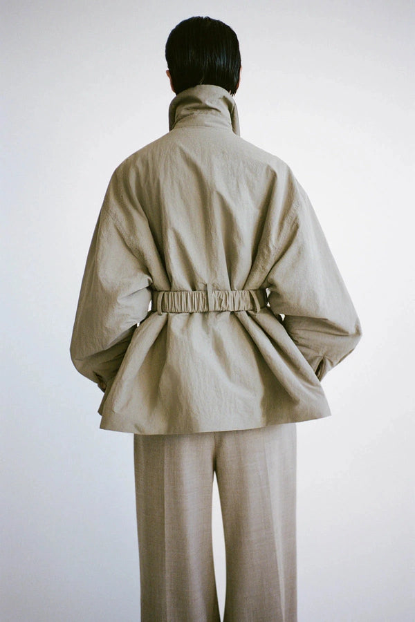 Manon Padded Belted Jacket Clay by camilla and marc – hammered texture belted puffer jacket with utility buckle.