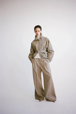 Manon Padded Belted Jacket Clay by camilla and marc – hammered texture belted puffer jacket with utility buckle.