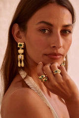 Maral Ring in Gold by Mountain & Moon, 18K gold plated double-band ring with aquamarine, peridot, and white CZ stones.