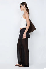 Maralia Overlay Pant by Bec + Bridge, a sheer georgette pant with contrast mini skirt overlay and tie waist for sleek, fashion-forward elegance.