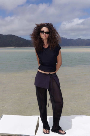 Maralia Overlay Pant by Bec + Bridge, a sheer georgette pant with contrast mini skirt overlay and tie waist for sleek, fashion-forward elegance.