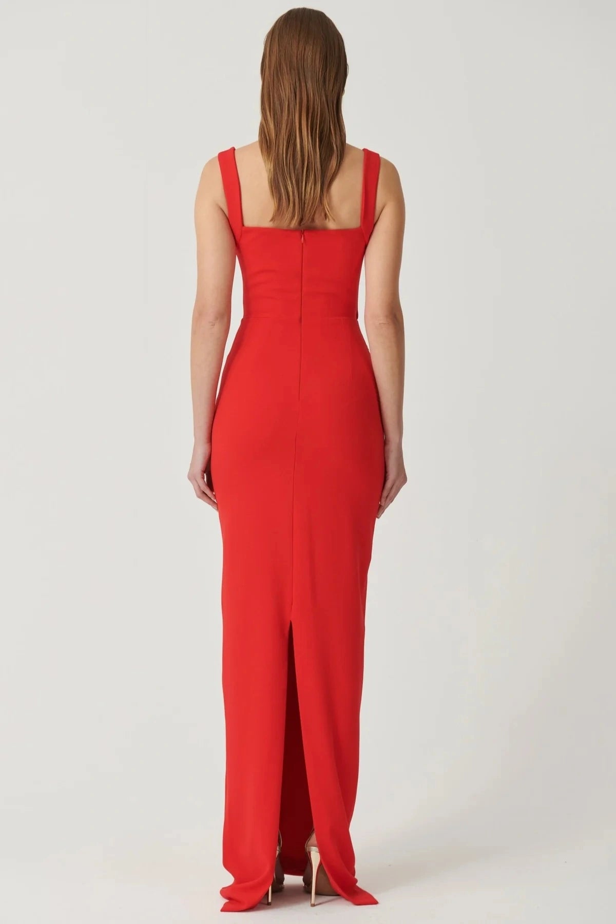 Marbella Gown Cherry Red by Effie Kats – A sleek crepe gown with bustier bodice, square neckline, and elegant draped detailing.