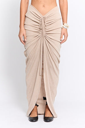 Marcellus Skirt Natural by Pfeiffer, ruched maxi skirt with adjustable front detail. Perfect for beach to bar outfits or relaxed looks.
