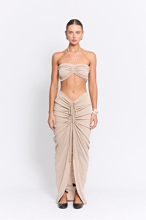 Marcellus Skirt Natural by Pfeiffer, ruched maxi skirt with adjustable front detail. Perfect for beach to bar outfits or relaxed looks.