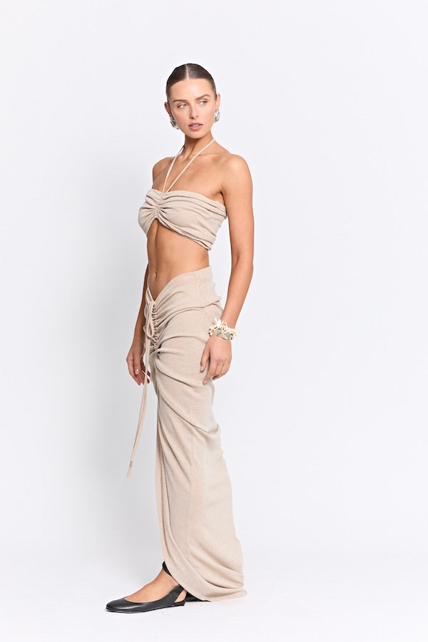 Marcellus Skirt Natural by Pfeiffer, ruched maxi skirt with adjustable front detail. Perfect for beach to bar outfits or relaxed looks.