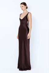 Marcy Cutout Maxi Dress by Bec + Bridge — dark chocolate maxi with scoop neckline, side cut-outs, and contrast binding.