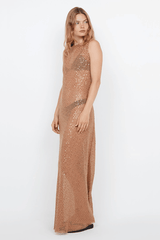 Margot Maxi Dress Camel by Bec + Bridge – A glamorous sequin-covered maxi with a boat neckline, sheer overlay, and raw hem, perfect for chic evening events.