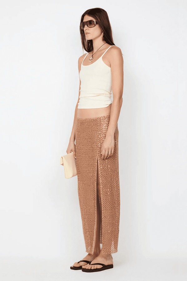 Margot Maxi Skirt Camel by BEC + BRIDGE — Shimmering sequin skirt with mid waist, straight fit, front split, and raw hem for a modern look.