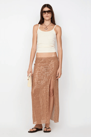Margot Maxi Skirt Camel by BEC + BRIDGE — Shimmering sequin skirt with mid waist, straight fit, front split, and raw hem for a modern look.