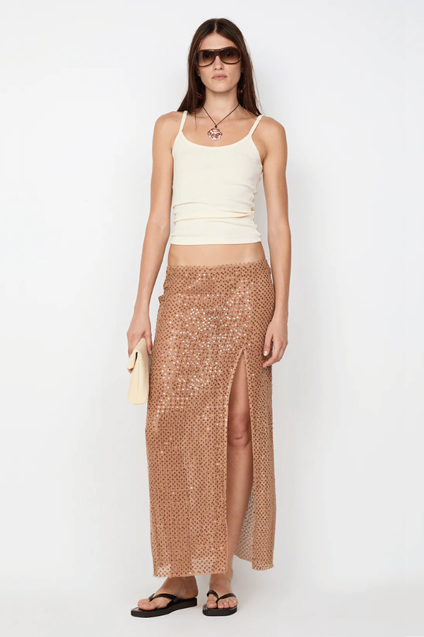 Margot Maxi Skirt Camel by BEC + BRIDGE — Shimmering sequin skirt with mid waist, straight fit, front split, and raw hem for a modern look.