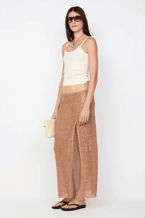 Margot Maxi Skirt Camel by BEC + BRIDGE — Shimmering sequin skirt with mid waist, straight fit, front split, and raw hem for a modern look.