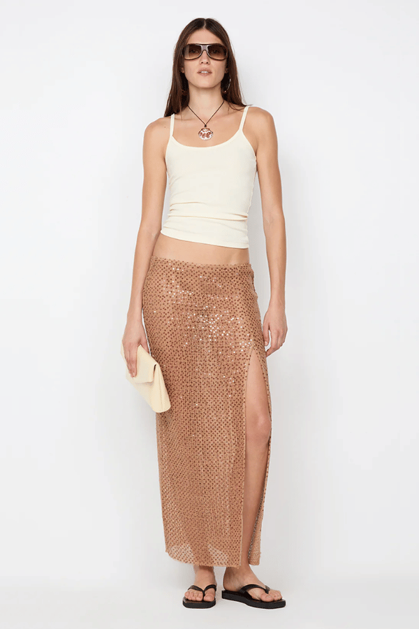 Margot Maxi Skirt Camel by BEC + BRIDGE — Shimmering sequin skirt with mid waist, straight fit, front split, and raw hem for a modern look.
