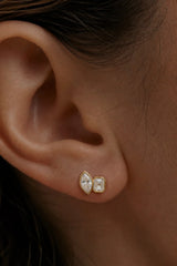 Marguerite Stud Earrings by Avant Studio – 18k gold plated sterling silver earrings with marquise and emerald-cut bezel-set stones.