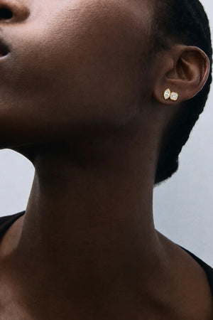 Marguerite Stud Earrings by Avant Studio – 18k gold plated sterling silver earrings with marquise and emerald-cut bezel-set stones.