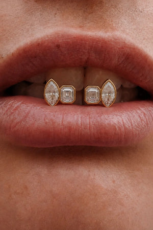 Marguerite Stud Earrings by Avant Studio – 18k gold plated sterling silver earrings with marquise and emerald-cut bezel-set stones.