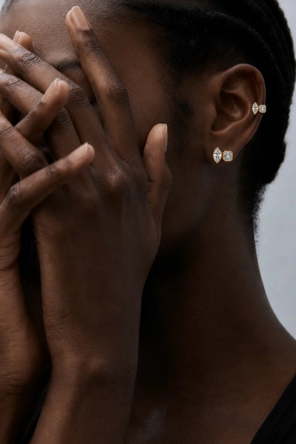 Marguerite Stud Earrings by Avant Studio – 18k gold plated sterling silver earrings with marquise and emerald-cut bezel-set stones.