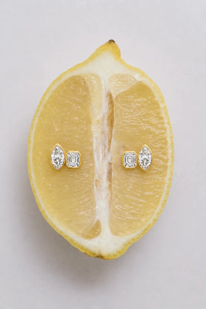 Marguerite Stud Earrings by Avant Studio – 18k gold plated sterling silver earrings with marquise and emerald-cut bezel-set stones.